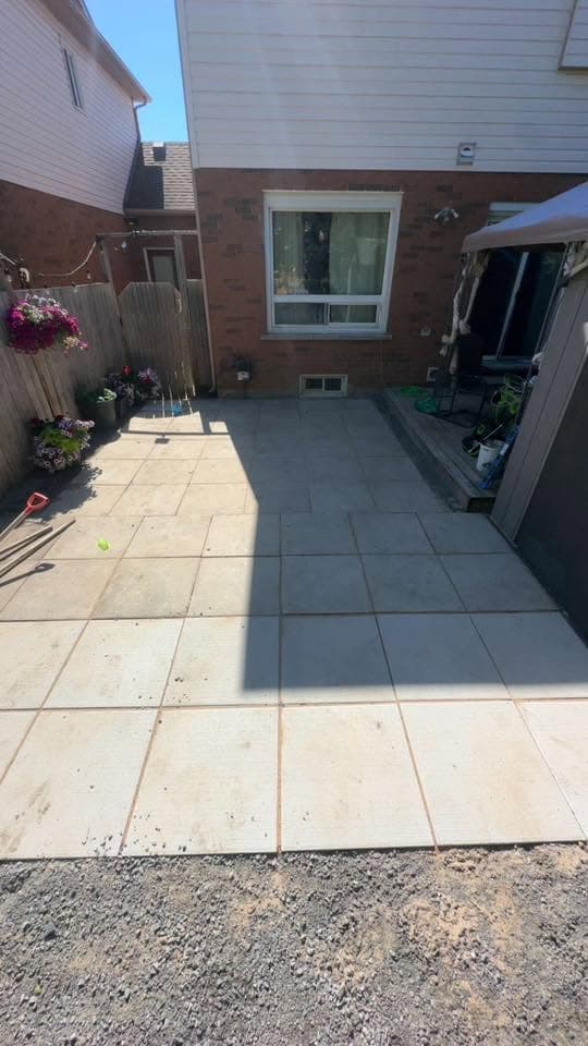 Finished paver patio installed in the same backyard